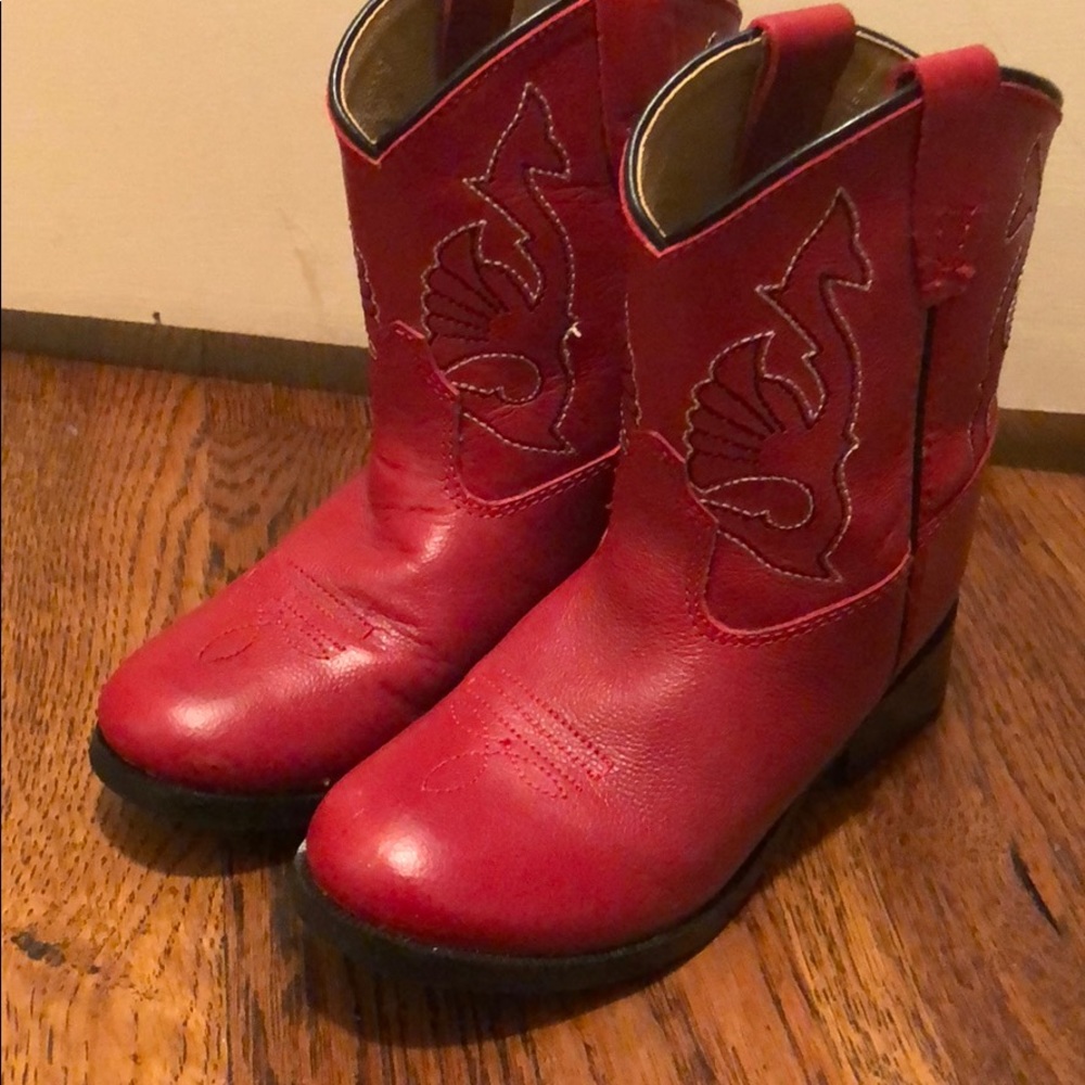 Never worn, bought in Nashville, red cowboy boots